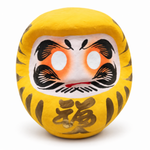 Daruma japonés amarillo de 12 cm con kanji dorado