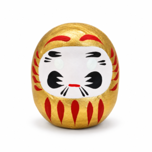 Daruma dorado japones de papel maché